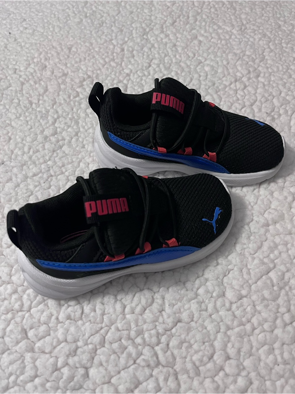 Puma Kids Black Sneakers with Blue and  Red Accents